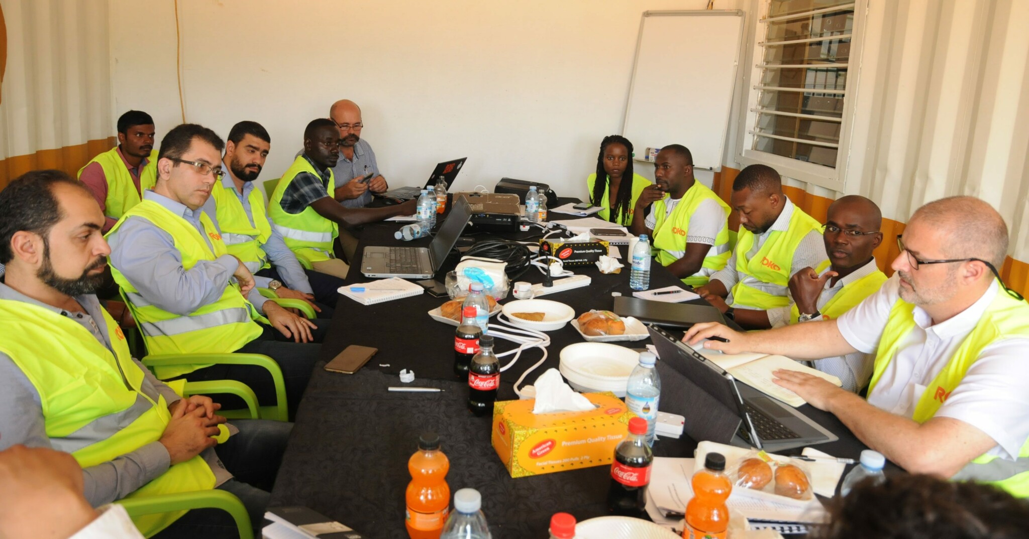 Raxio data center in africa echnical-experts-evaluating-the-construction-and-design-progress-at-a-review-meeting