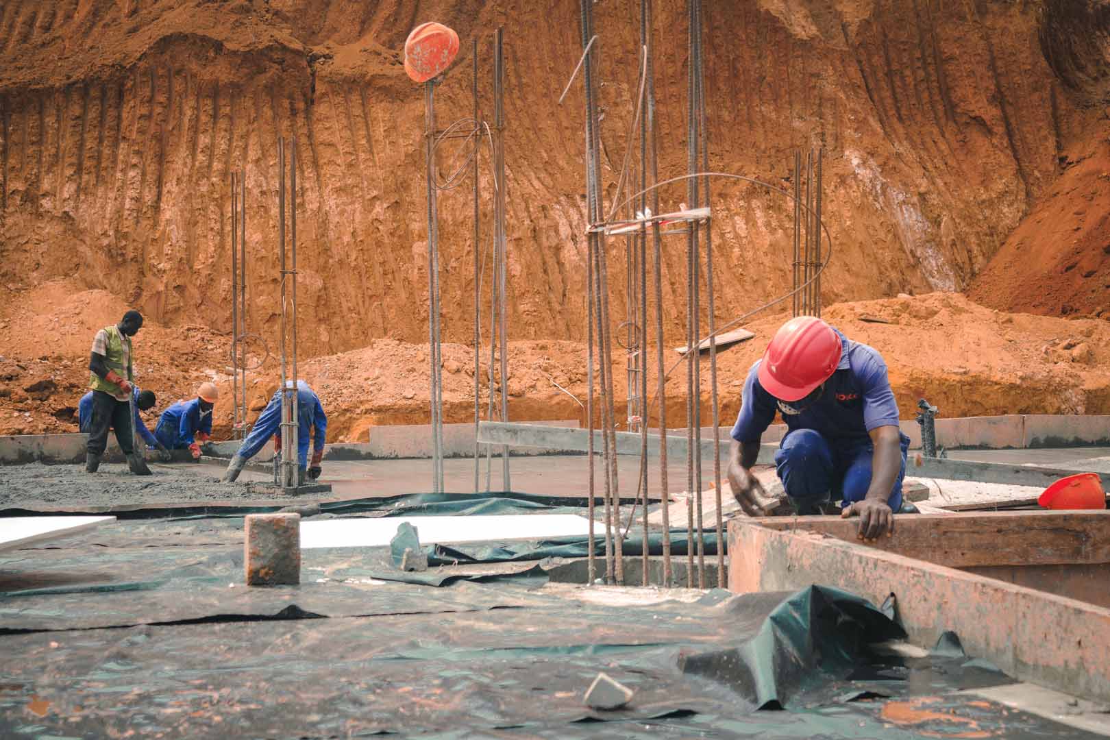 Raxio data center in africa Roko-construction-worker-preparing area for concrete filling on slab